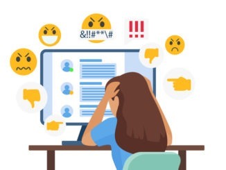 A person looks at a computer with their head in their hands. Negative emojis surround them.