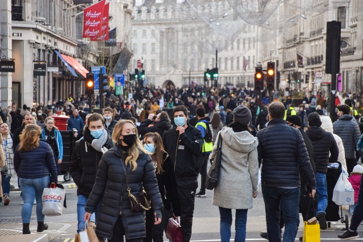 People with face masks on Regent Street, London