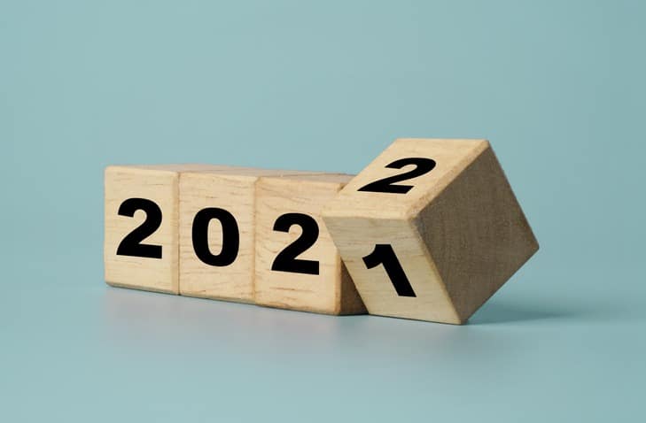 Flipping of wooden cube block for change 2021 to 2022 , Merry Christmas and Happy new year preparation.