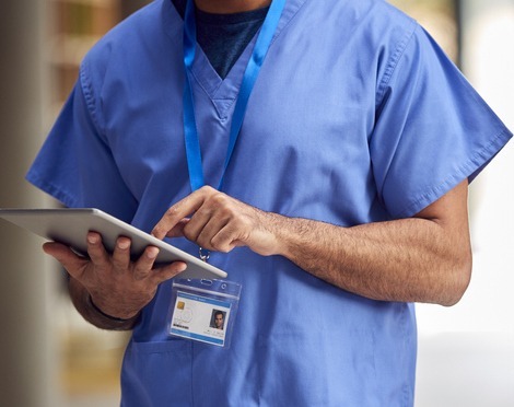 Nurse holding electronic tablet