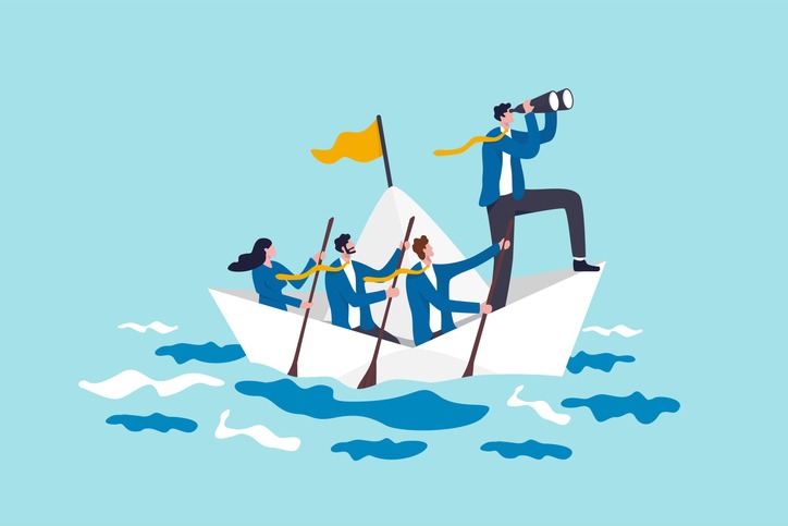 Leadership to lead business teamwork or support to achieve target. businessman leader with binoculars lead business team sailing origami ship.