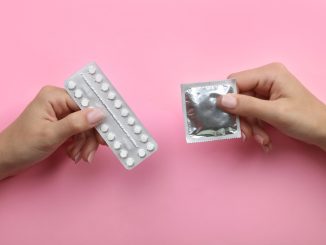 Contraceptive means: a condom and birth control pills