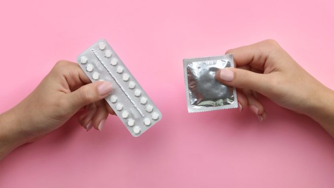 Contraceptive means: a condom and birth control pills