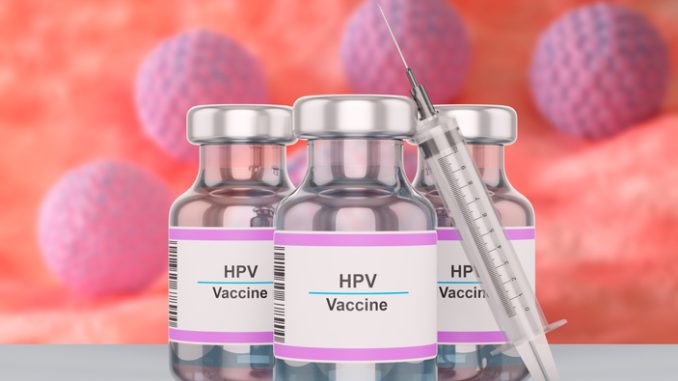 Bottle of human papilloma virus HPV vaccine with syringe