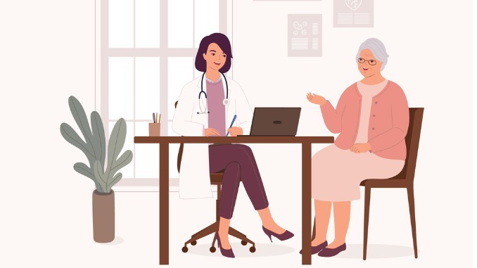 Smiling Female Doctor Or General Practitioner Having A Clinical Consultation While Writing Notes For A Senior Woman Patient