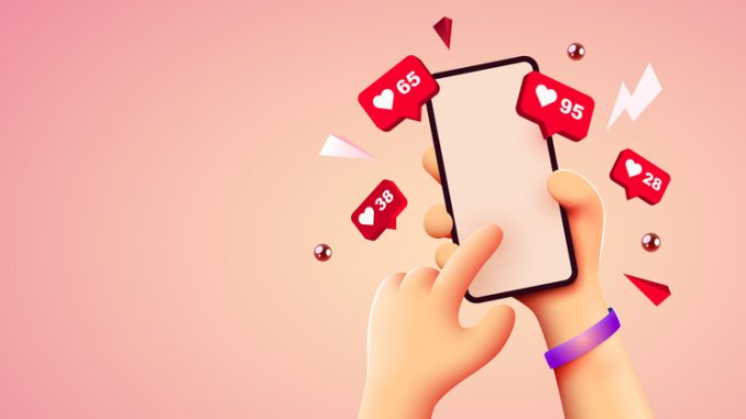 Cute 3D cartoon hand holding mobile smartphone with Likes notification icons.