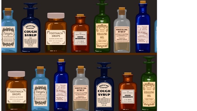 Vintage medicine bottles on wooden shelves. 