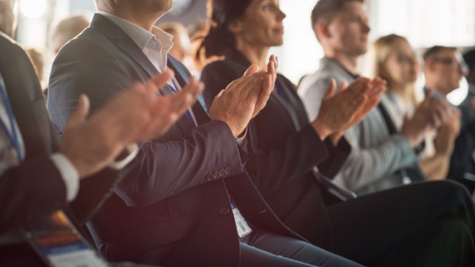 Close Up on Hands of Audience Applauding 