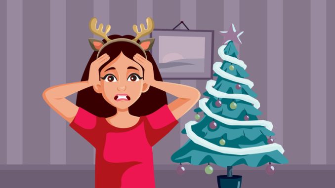 Unhappy girl feeling desperate trying to organize xmas