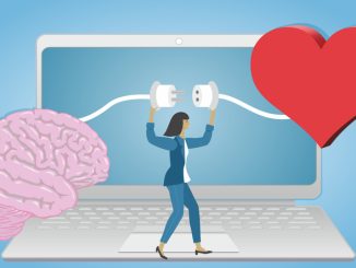 Computer with woman connecting brain and heart.