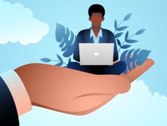 Giant hand holding a businessman who works on laptop