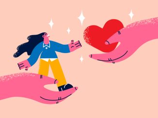 Woman and heart in hands showing support