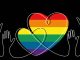 Continuous one line drawing of hands and hearts with LGBT flag color,