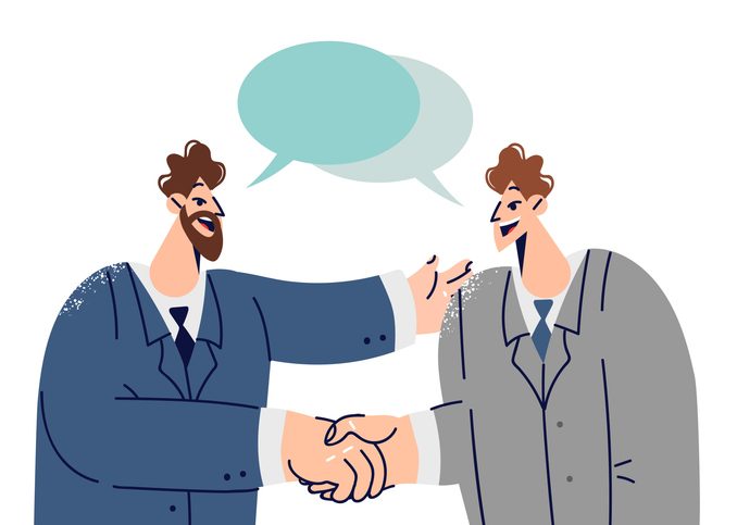 Handshakes of two white collar workers with dialogue clouds entering into partnership agreement