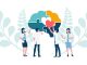 Teamwork of doctor assembling a brain with heart jigsaw puzzle. Concept for wellness of mental health and mindfulness in psychiatric therapy in depression and mental illness patient.