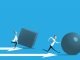 Businessman pushing sphere and leading the race against group other not so lucky guy pushing boxes.