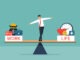 Work life balance concept, businessman standing with WORK and LIFE on seesaw