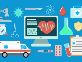 Healthcare icons arranged around computer monitor showing heartbeat