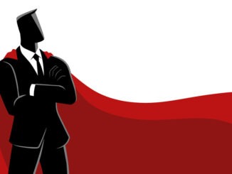 Businessman as a superhero, wearing a magnificent red cape