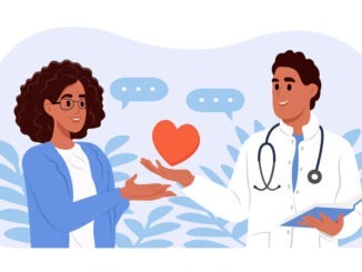 Young smiling doctor holding a heart. A doctor gives support and care to an elderly woman