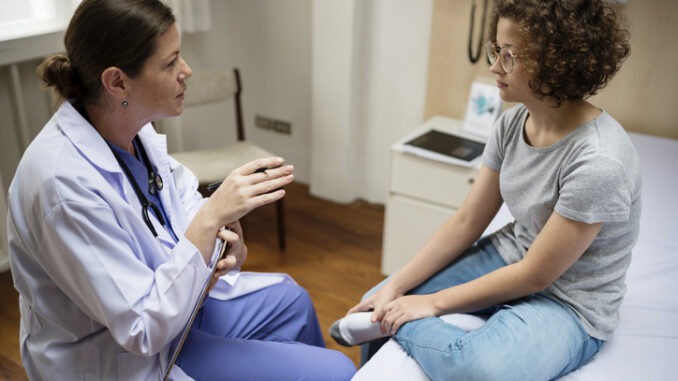 Doctor is checking a patient