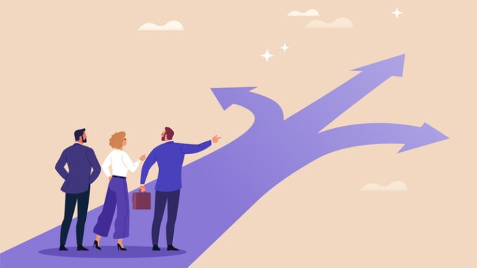 Vector cartoon illustration of a business team standing at a crossroad with multiple arrows, discussing and choosing the right path toward success and future opportunities.
