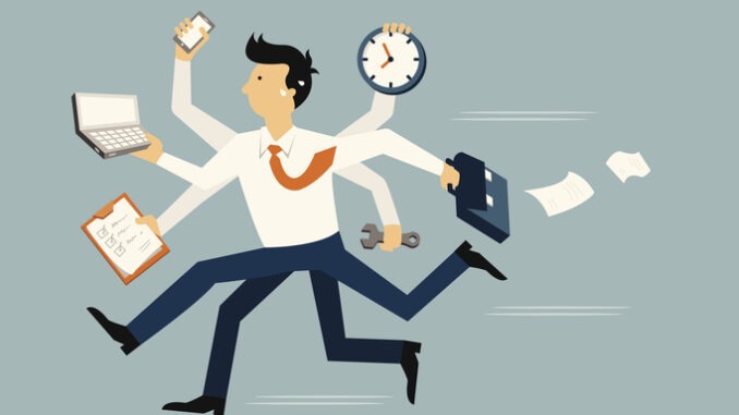 Businessman running in a hurry with many hands holding time, smart phone, laptop, wrench, papernote and briefcase, business concept in very busy or a lot of work to do.