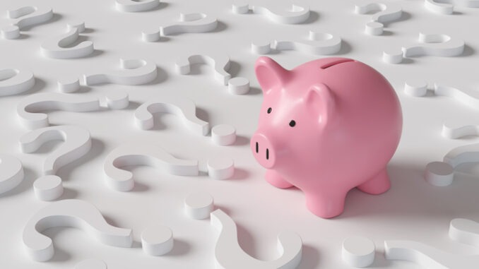 Pink piggy bank standing among white question marks on white background. Illustration of the concept of investment strategies and economic forecast