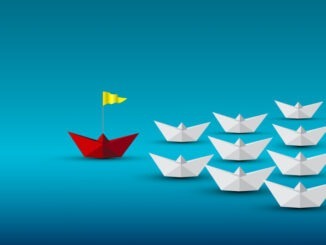 Red paper boat with yellow flag leading white boats on blue background represents leadership, success, vision, innovation, confidence, teamwork in business, strategy, and creative management concept.