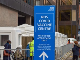 London, United Kingdom - January 21 2021: People visiting the NHS Covid vaccination centre in Wembley.