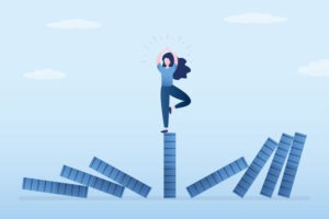 Risk management. Economic crash, financial collapse. Businesswoman meditating for relax. Reduce stress and eliminate distraction. Confident woman meditating with yoga pose on standing domino. Vector