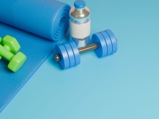3D rendered workout equipment for training at home on blue background, Top view.